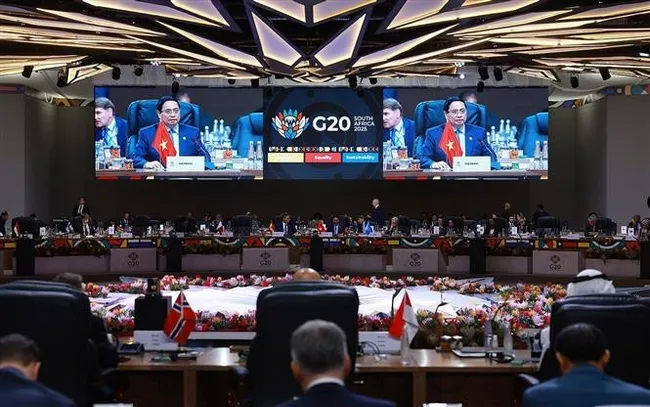 Prime Minister Pham Minh Chinh speaks at the G20 Summit’s third session on November 23. (Photo: VNA)