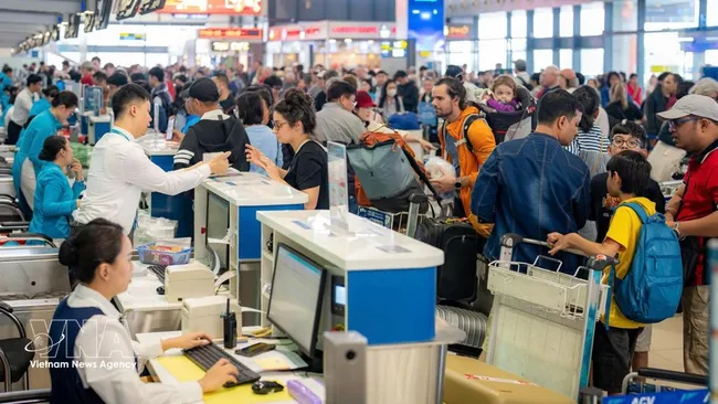 Noi Bai International Airport activates plans to accommodate rising passenger volumes during the 2026 Tet holiday. (Photo: VietnamPlus)