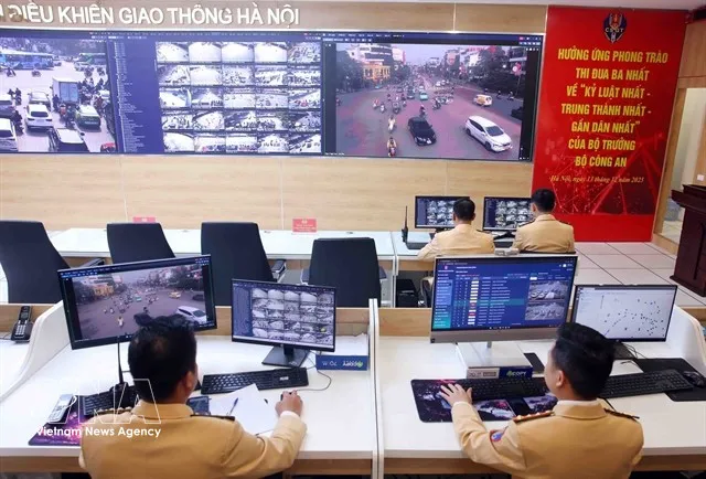 Police officers at the Hanoi traffic control centre (Photo: VNA)
