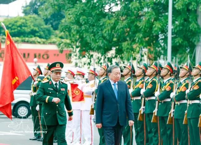 Military Commission, attends a ceremony to confer the title of 