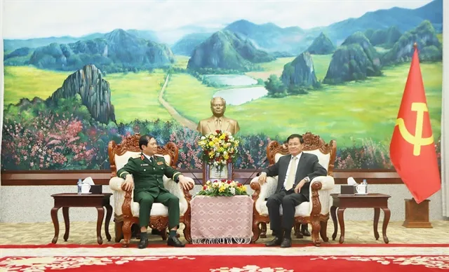 General Secretary of the Lao People's Revolutionary Party (LPRP) Central Committee and President of Laos Thongloun Sisoulith (right) received General Nguyễn Tân Cương, Chief of the General Staff of the Việt Nam People’s Army and Deputy Minister of National Defence in Vientiane on April 22. — VNA/VNS Photo