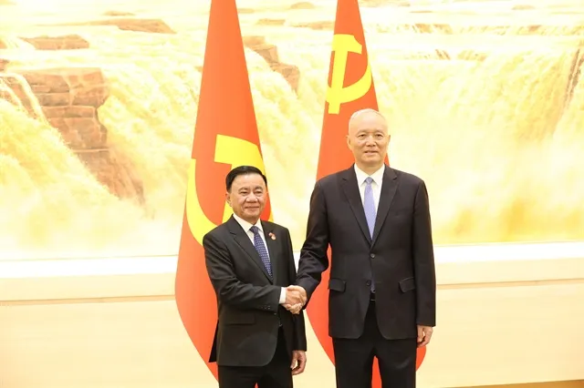 Politburo member and Permanent member of the Communist Party of Việt Nam (CPV) Central Committee’s Secretariat Trần Cẩm Tú (right) and Cai Qi, member of the Standing Committee of the Political Bureau of the Communist Party of China (CPC) Central Committee, Secretary of the CPC Central Committee’s Secretariat and Chief of the CPC Central Committee's Office at their meeting in Beijing on April 15. — VNA/VNS Photo