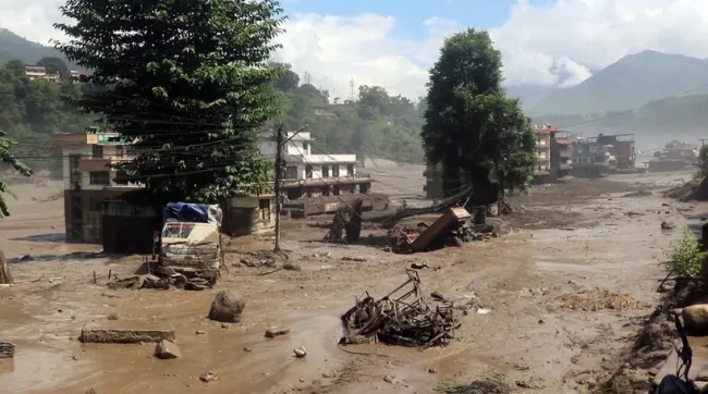 Area devastated by flash floods carrying mud and debris in Rasuwa district, Nepal on August 26 (Photo: ANI/VNA)