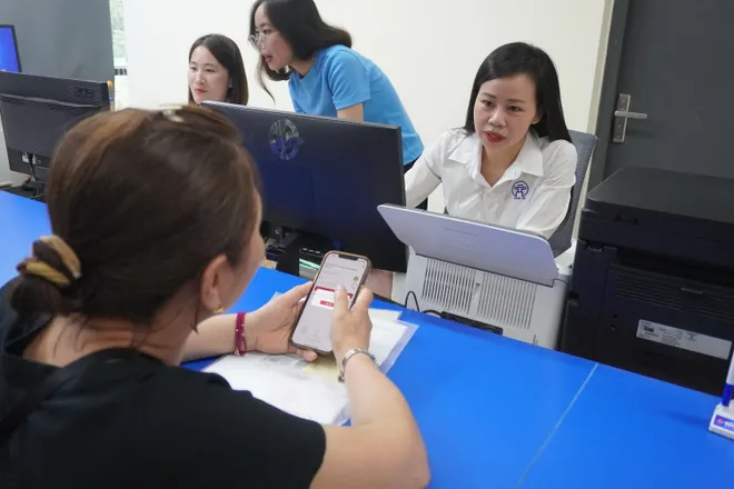 Hà Nội bắt đầu vận hành mô hình chính quyền hai cấp  - Ảnh 16.