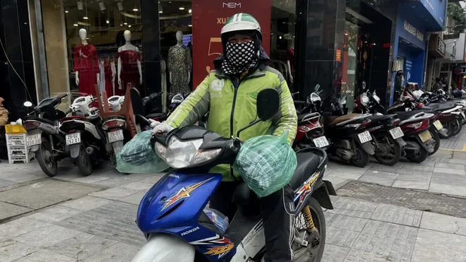 C&aacute;i lạnh buốt gi&aacute; đầu năm khiến nhịp sống Thủ đ&ocirc; chậm lại- Ảnh 8.