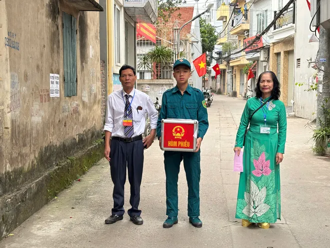 Ngày hội bầu cử lan tỏa đến từng mái nhà - Ảnh 1.