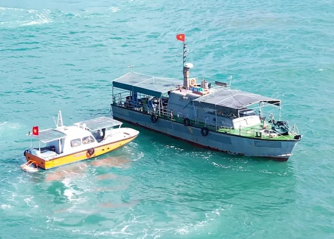 Bộ đội Bi&ecirc;n ph&ograve;ng diễn tập ứng ph&oacute; sự cố tr&ecirc;n biển - Ảnh 3.