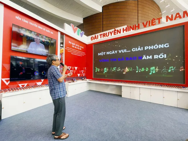 Ekip "L&aacute; xanh" khuấy động kh&ocirc;ng kh&iacute; gian trưng b&agrave;y của VTV tại Hội b&aacute;o To&agrave;n quốc 2026 - Ảnh 7.