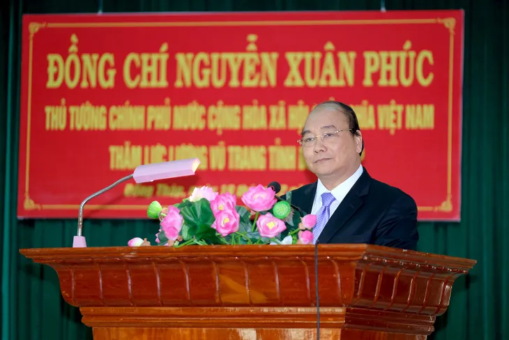 Thủ tướng Nguyễn Xuân Phúc thăm Bộ Chỉ huy quân sự tỉnh Đồng Tháp - Ảnh 1. Thủ tướng Nguyễn Xuân Phúc thăm Bộ Chỉ huy quân sự tỉnh Đồng Tháp - Ảnh 1.