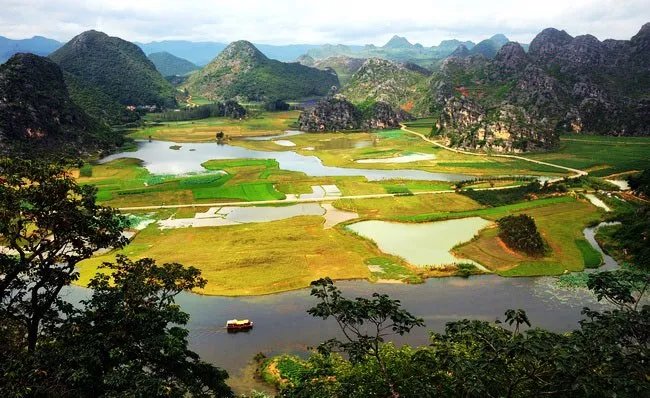 Mùa hè rực rỡ tại công viên sinh thái Puzhehei, Trung Quốc - Ảnh 1. Mùa hè rực rỡ tại công viên sinh thái Puzhehei, Trung Quốc - Ảnh 1.
