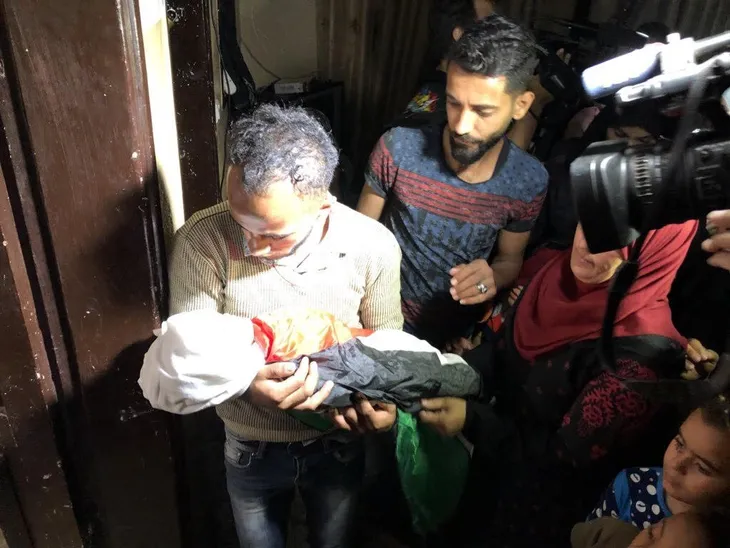 Bé gái 8 tháng tuổi thiệt mạng vì hơi cay tại Dải Gaza - Ảnh 1. Bé gái 8 tháng tuổi thiệt mạng vì hơi cay tại Dải Gaza - Ảnh 1.