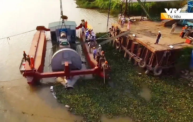Nhiều giải pháp đối phó với ngập úng tại Hà Nội và TP.HCM - Ảnh 1. Nhiều giải pháp đối phó với ngập úng tại Hà Nội và TP.HCM - Ảnh 1.