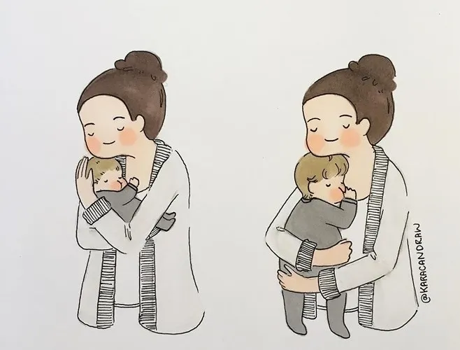 Khoảnh khắc ấm áp của tình mẫu tử chạm vào mọi trái tim - Ảnh 1. Khoảnh khắc ấm áp của tình mẫu tử chạm vào mọi trái tim - Ảnh 1.