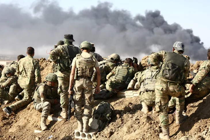 Người Kurd bắt tay với chính phủ Syria - Bước ngoặt mới trong cuộc chiến - Ảnh 1. Người Kurd bắt tay với chính phủ Syria - Bước ngoặt mới trong cuộc chiến - Ảnh 1.