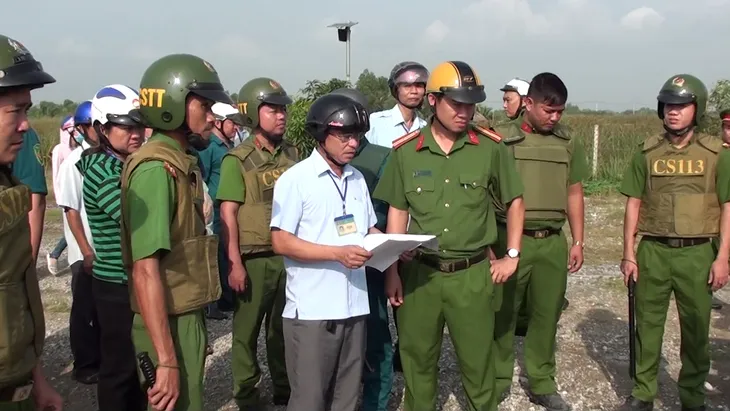 TP.HCM cưỡng chế thu hồi đất công ở quận 9 - Ảnh 1.