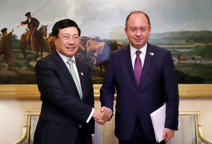 Phó Thủ tướng Phạm Bình Minh tiếp xúc song phương trong khuôn khổ dự FMM 14 - Ảnh 1. Phó Thủ tướng Phạm Bình Minh tiếp xúc song phương trong khuôn khổ dự FMM 14 - Ảnh 1.