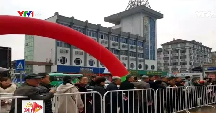 Ngân hàng Trung Quốc hút khách bằng cách tặng thịt lợn - Ảnh 1. Ngân hàng Trung Quốc hút khách bằng cách tặng thịt lợn - Ảnh 1.