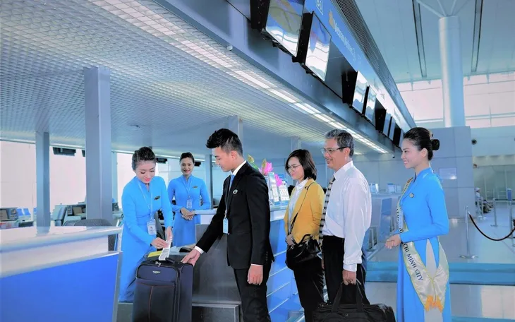Vietnam Airlines triển khai dịch vụ làm thủ tục hàng không nhanh chóng - Ảnh 1. Vietnam Airlines triển khai dịch vụ làm thủ tục hàng không nhanh chóng - Ảnh 1.