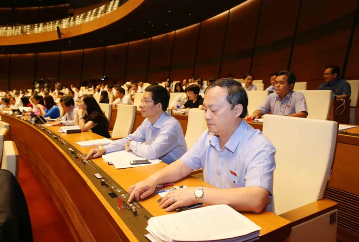 Quốc hội biểu quyết thông qua Luật sửa đổi, bổ sung một số điều của Luật Kinh doanh bảo hiểm và Luật Sở hữu trí tuệ - Ảnh 1. Quốc hội biểu quyết thông qua Luật sửa đổi, bổ sung một số điều của Luật Kinh doanh bảo hiểm và Luật Sở hữu trí tuệ - Ảnh 1.