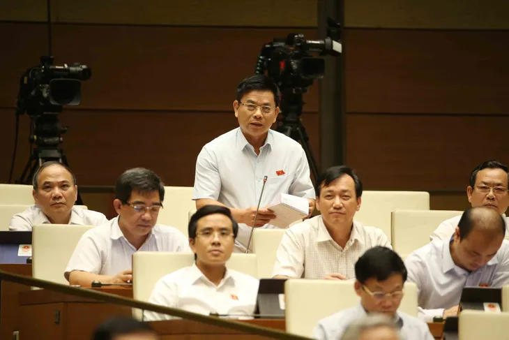 Bộ trưởng Bộ Xây dựng: Trách nhiệm xử lý sai phạm khu HH Linh Đàm, 8B Lê Trực là của Hà Nội - Ảnh 1. Bộ trưởng Bộ Xây dựng: Trách nhiệm xử lý sai phạm khu HH Linh Đàm, 8B Lê Trực là của Hà Nội - Ảnh 1.