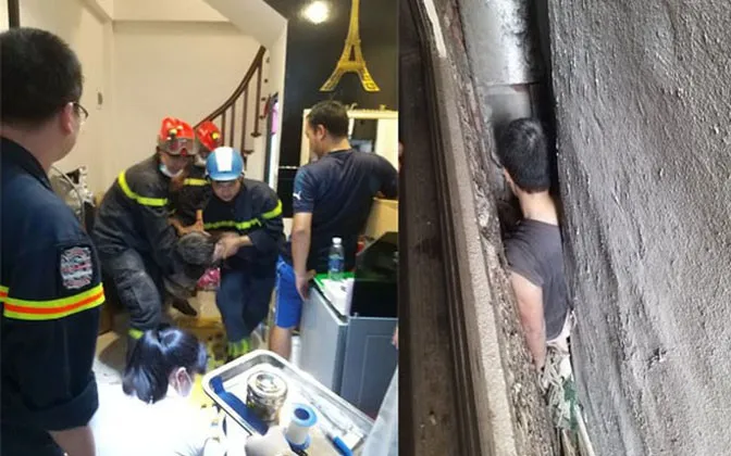 Hà Nội: Giải cứu người đàn ông mắc kẹt trong khoảng không của 3 ngôi nhà - Ảnh 1. Hà Nội: Giải cứu người đàn ông mắc kẹt trong khoảng không của 3 ngôi nhà - Ảnh 1.