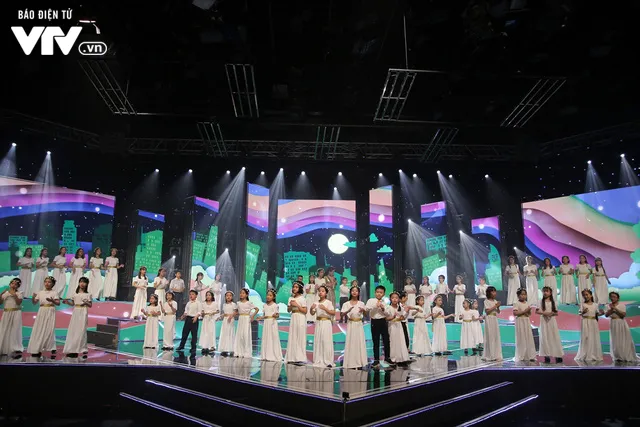 Phương Vy hòa giọng cùng dàn thiên thần nhí trong Đón Tết cùng VTV 2020 - Ảnh 12. Phương Vy hòa giọng cùng dàn thiên thần nhí trong Đón Tết cùng VTV 2020 - Ảnh 12.