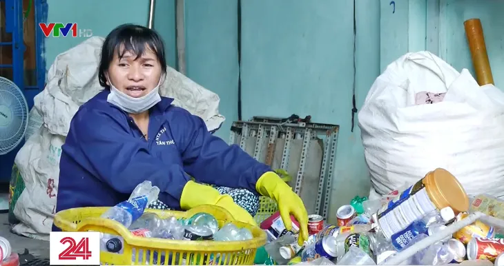 Tết của những người thu gom rác - Ảnh 1. Tết của những người thu gom rác - Ảnh 1.