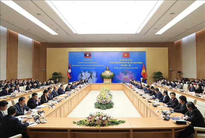 Kỳ họp lần thứ 42 Ủy ban liên Chính phủ Việt Nam - Lào - Ảnh 4. Kỳ họp lần thứ 42 Ủy ban liên Chính phủ Việt Nam - Lào - Ảnh 4.