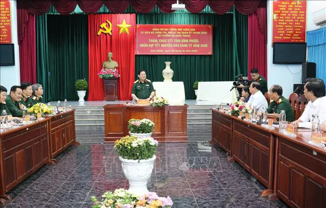 Đại tướng Ngô Xuân Lịch thăm và chúc Tết tại tỉnh Bình Phước - Ảnh 1. Đại tướng Ngô Xuân Lịch thăm và chúc Tết tại tỉnh Bình Phước - Ảnh 1.