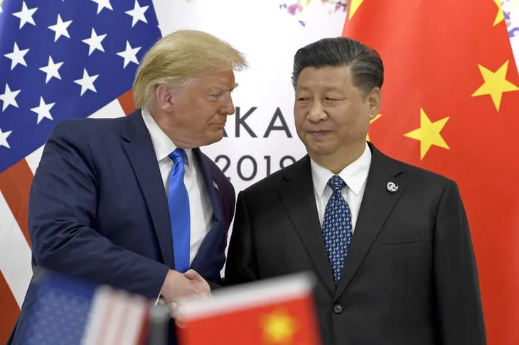 Tổng thống Trump ký sắc lệnh hạn chế đầu tư vào Trung Quốc - Ảnh 1. Tổng thống Trump ký sắc lệnh hạn chế đầu tư vào Trung Quốc - Ảnh 1.