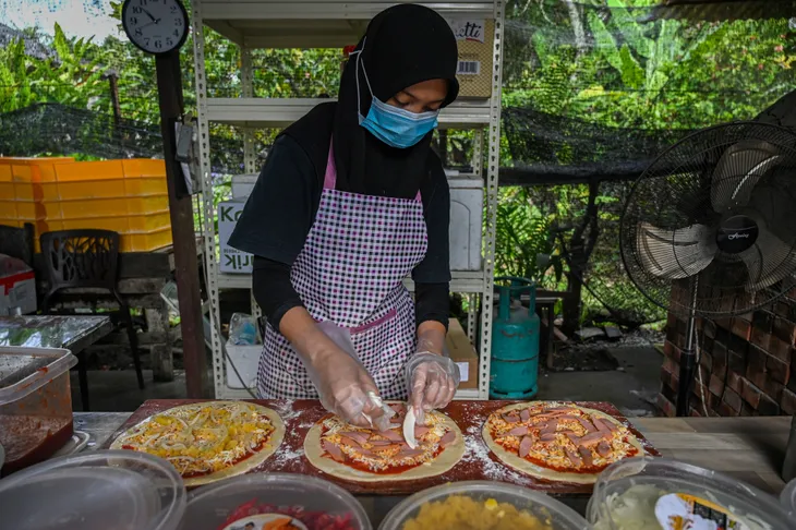 Malaysia: Vượt khó thời dịch COVID-19 nhờ ý tưởng nhà hàng pizza tại gia - Ảnh 1. Malaysia: Vượt khó thời dịch COVID-19 nhờ ý tưởng nhà hàng pizza tại gia - Ảnh 1.