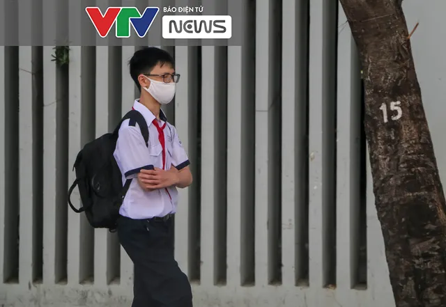 TP.HCM: Người dân nâng cao ý thức đeo khẩu trang nơi công cộng - Ảnh 4. TP.HCM: Người dân nâng cao ý thức đeo khẩu trang nơi công cộng - Ảnh 4.