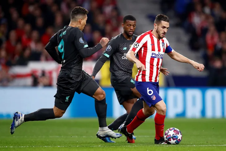 ẢNH: Atletico Madrid thắng tối thiểu Liverpool ở lượt đi vòng 1/8 UEFA Champions League - Ảnh 2. ẢNH: Atletico Madrid thắng tối thiểu Liverpool ở lượt đi vòng 1/8 UEFA Champions League - Ảnh 2.