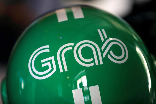 Grab cắt giảm 5% nhân sự - Ảnh 1. Grab cắt giảm 5% nhân sự - Ảnh 1.