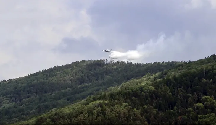 Nga: Cháy rừng hoành hành tại Siberia, khói mù bao trùm nhiều khu vực - Ảnh 3. Nga: Cháy rừng hoành hành tại Siberia, khói mù bao trùm nhiều khu vực - Ảnh 3.