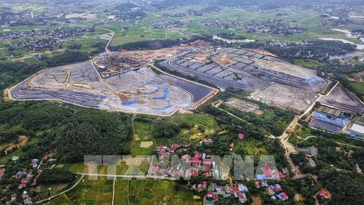 Bãi rác Nam Sơn hoạt động trở lại - Ảnh 1. Bãi rác Nam Sơn hoạt động trở lại - Ảnh 1.
