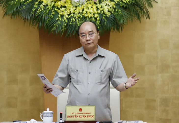 Thủ tướng Nguyễn Xuân Phúc: Bảo vệ sức khỏe nhân dân nhưng không để đổ gãy kinh tế - Ảnh 1. Thủ tướng Nguyễn Xuân Phúc: Bảo vệ sức khỏe nhân dân nhưng không để đổ gãy kinh tế - Ảnh 1.
