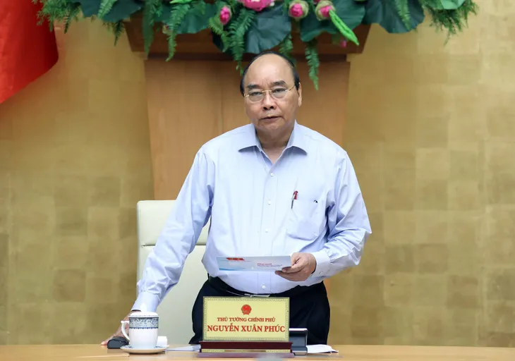 Thủ tướng Nguyễn Xuân Phúc: Xem xét mở lại một số đường bay thương mại quốc tế - Ảnh 1. Thủ tướng Nguyễn Xuân Phúc: Xem xét mở lại một số đường bay thương mại quốc tế - Ảnh 1.
