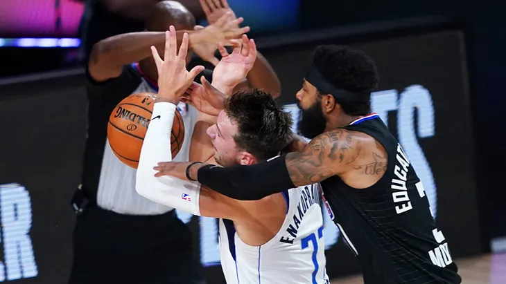 NBA ra án phạt sau vụ xô xát tại game 6 series L.A Clippers - Dallas Mavericks - Ảnh 1. NBA ra án phạt sau vụ xô xát tại game 6 series L.A Clippers - Dallas Mavericks - Ảnh 1.