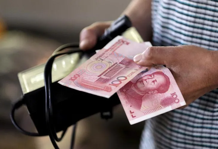 Nhân dân tệ sẽ trở thành đồng tiền dự trữ lớn thứ 3 thế giới? - Ảnh 1. Nhân dân tệ sẽ trở thành đồng tiền dự trữ lớn thứ 3 thế giới? - Ảnh 1.