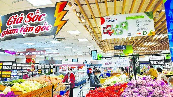 Tăng sức mua cuối năm: Không chỉ khuyến mãi - Ảnh 1. Tăng sức mua cuối năm: Không chỉ khuyến mãi - Ảnh 1.