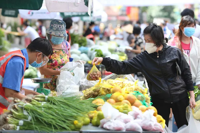 Gần 80% chợ truyền thống ở TP Hồ Chí Minh khôi phục hoạt động - Ảnh 1. Gần 80% chợ truyền thống ở TP Hồ Chí Minh khôi phục hoạt động - Ảnh 1.
