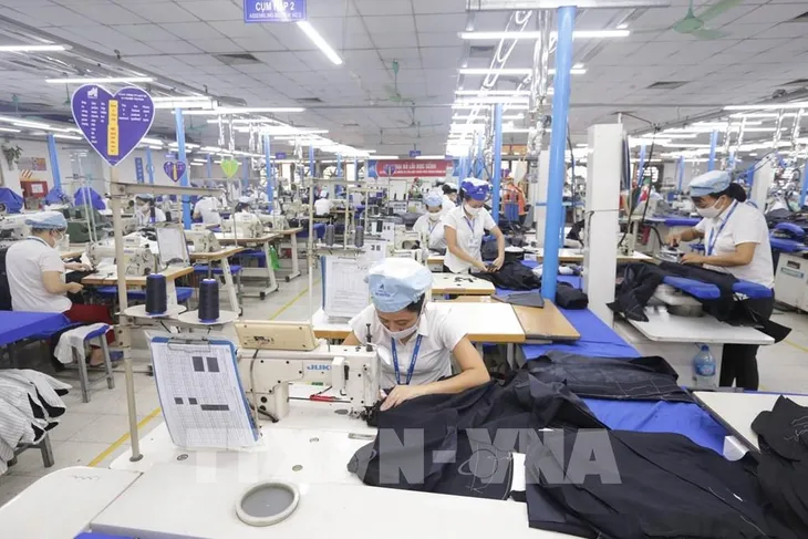 WB: Hai nhân tố giúp Việt Nam đạt được mục tiêu tăng trưởng 6-6,5% năm 2022 - Ảnh 1. WB: Hai nhân tố giúp Việt Nam đạt được mục tiêu tăng trưởng 6-6,5% năm 2022 - Ảnh 1.