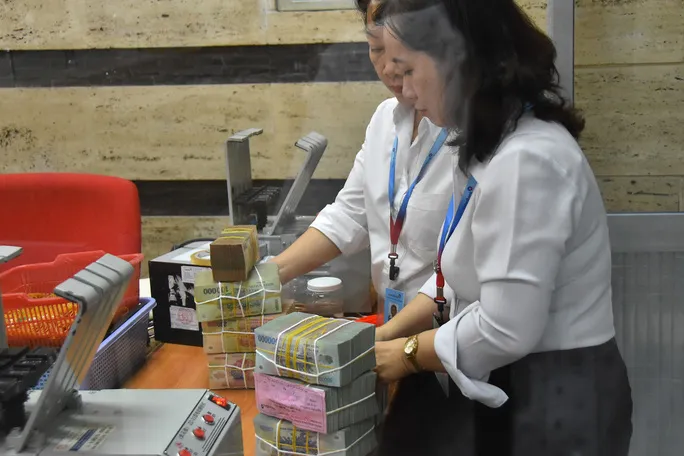 Xu hướng lãi suất năm 2022 dự báo vẫn neo ở mức thấp - Ảnh 1. Xu hướng lãi suất năm 2022 dự báo vẫn neo ở mức thấp - Ảnh 1.