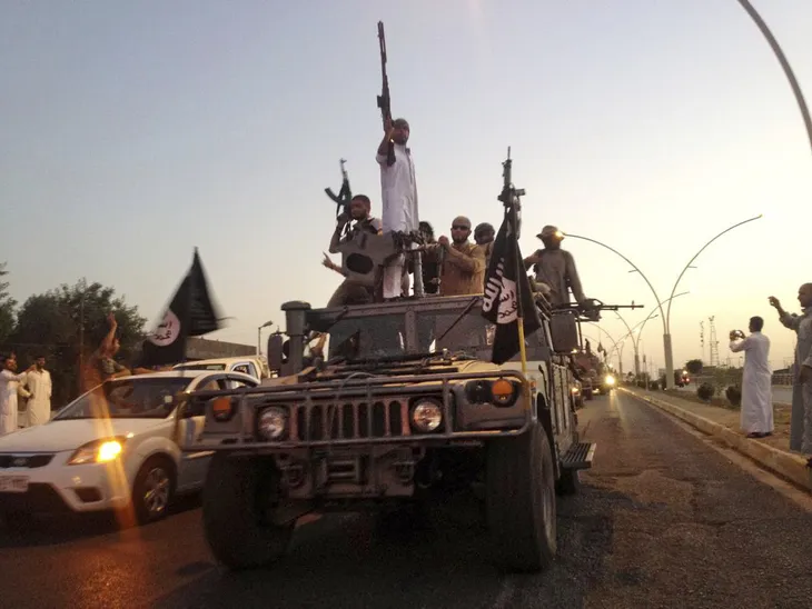 IS tấn công ngôi làng của Iraq sát hại 13 người - Ảnh 1. IS tấn công ngôi làng của Iraq sát hại 13 người - Ảnh 1.