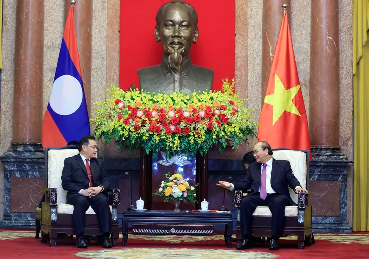 Với Lào, Việt Nam sẽ luôn thực hiện phương châm hạt muối cắn đôi, cọng rau bẻ nửa - Ảnh 1. Với Lào, Việt Nam sẽ luôn thực hiện phương châm hạt muối cắn đôi, cọng rau bẻ nửa - Ảnh 1.