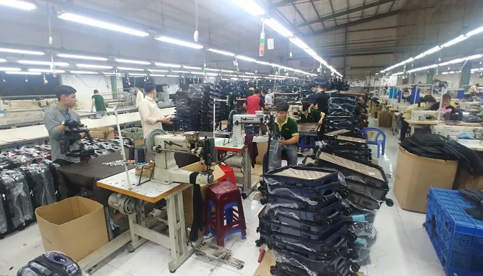 Vali, túi xách, mũ, ô, dù tăng tốc xuất khẩu - Ảnh 1. Vali, túi xách, mũ, ô, dù tăng tốc xuất khẩu - Ảnh 1.