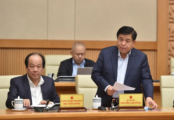 COVID-19 bùng phát, kịch bản nào cho kinh tế Việt Nam? - Ảnh 1. COVID-19 bùng phát, kịch bản nào cho kinh tế Việt Nam? - Ảnh 1.