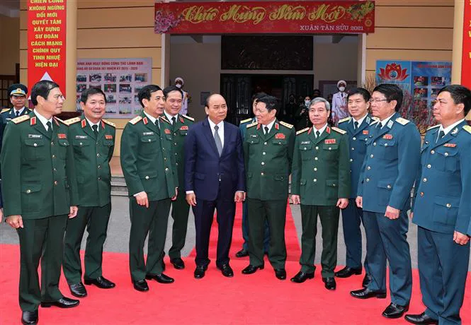 Thủ tướng Nguyễn Xuân Phúc: Quân đội không được để Tổ quốc bị bất ngờ - Ảnh 1. Thủ tướng Nguyễn Xuân Phúc: Quân đội không được để Tổ quốc bị bất ngờ - Ảnh 1.