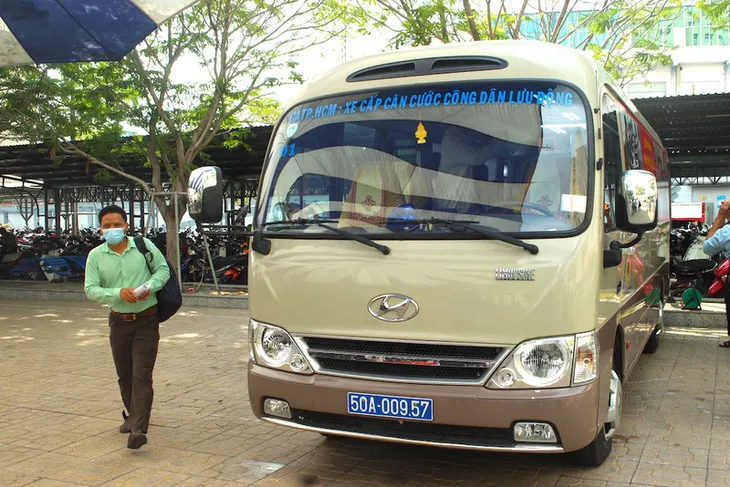 TP Hồ Chí Minh cấp căn cước công dân gắn chip ngay trên xe ô tô lưu động - Ảnh 1.